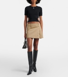 Courrèges Logo cutout tie-back cotton crop top