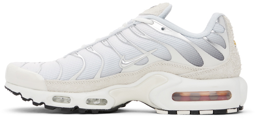 gray and white nike air