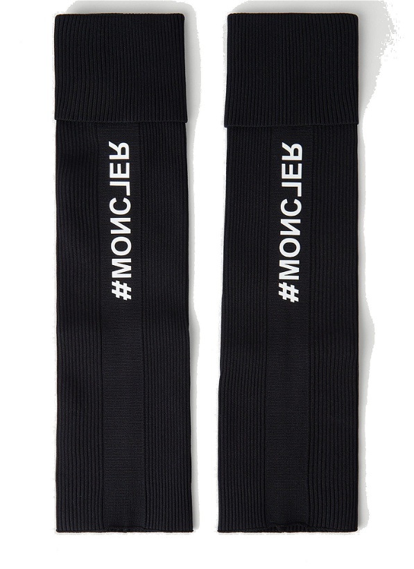 Photo: Logo Print Leg Warmers in Black