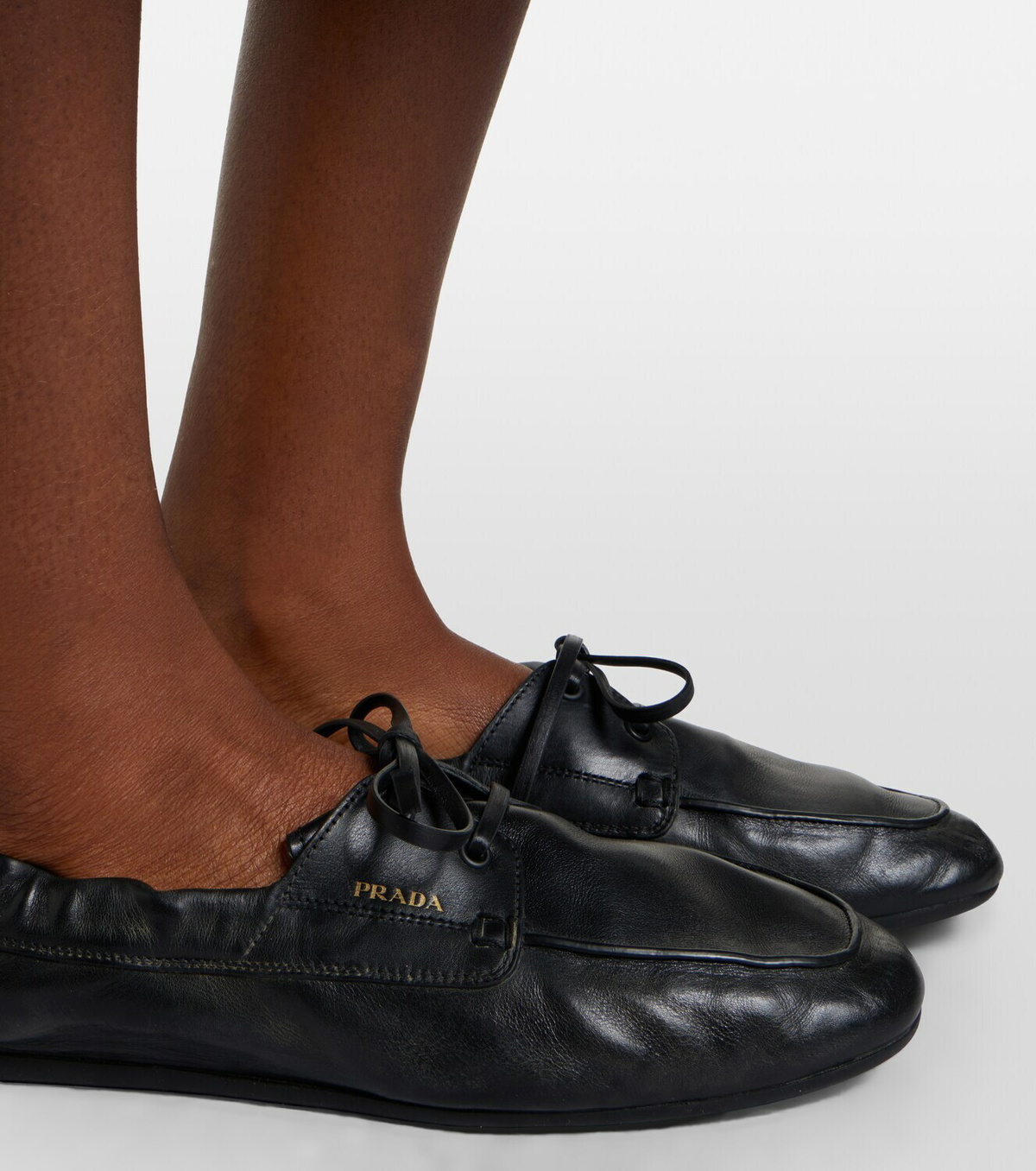 Prada Shuffle leather boat shoes