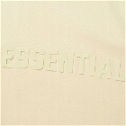 Fear of God ESSENTIALS Logo Long Sleeve T-Shirt in Egg Shell