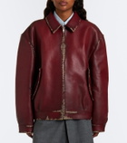 Prada Distressed houndstooth leather jacket
