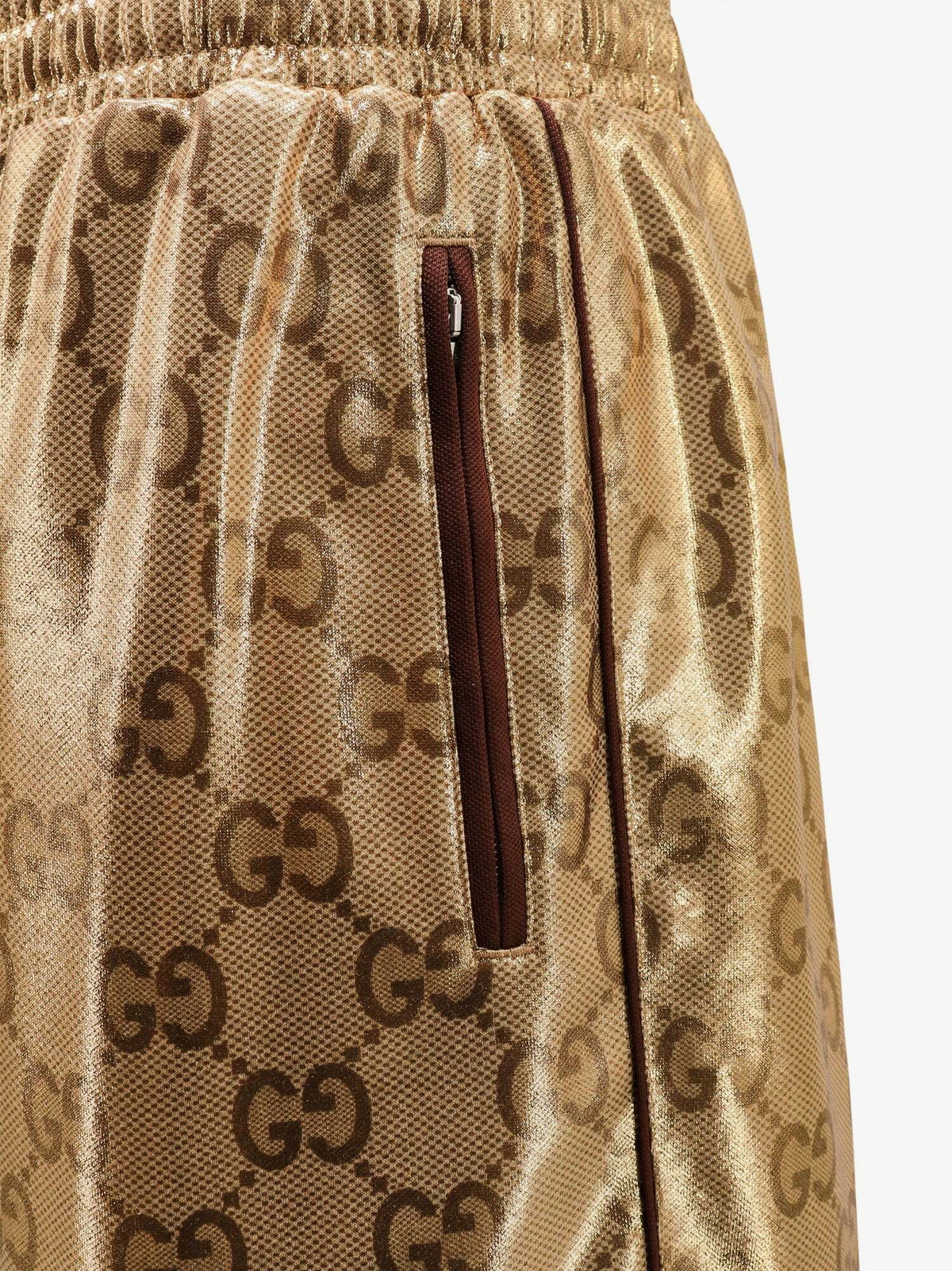 gold gucci shorts