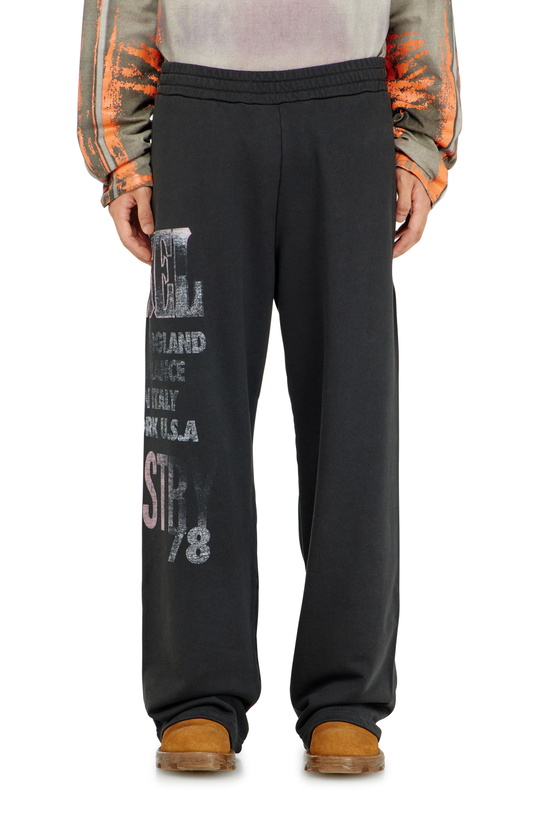 Photo: Diesel Sweatpants with concert graphics - Pants Mens in Black