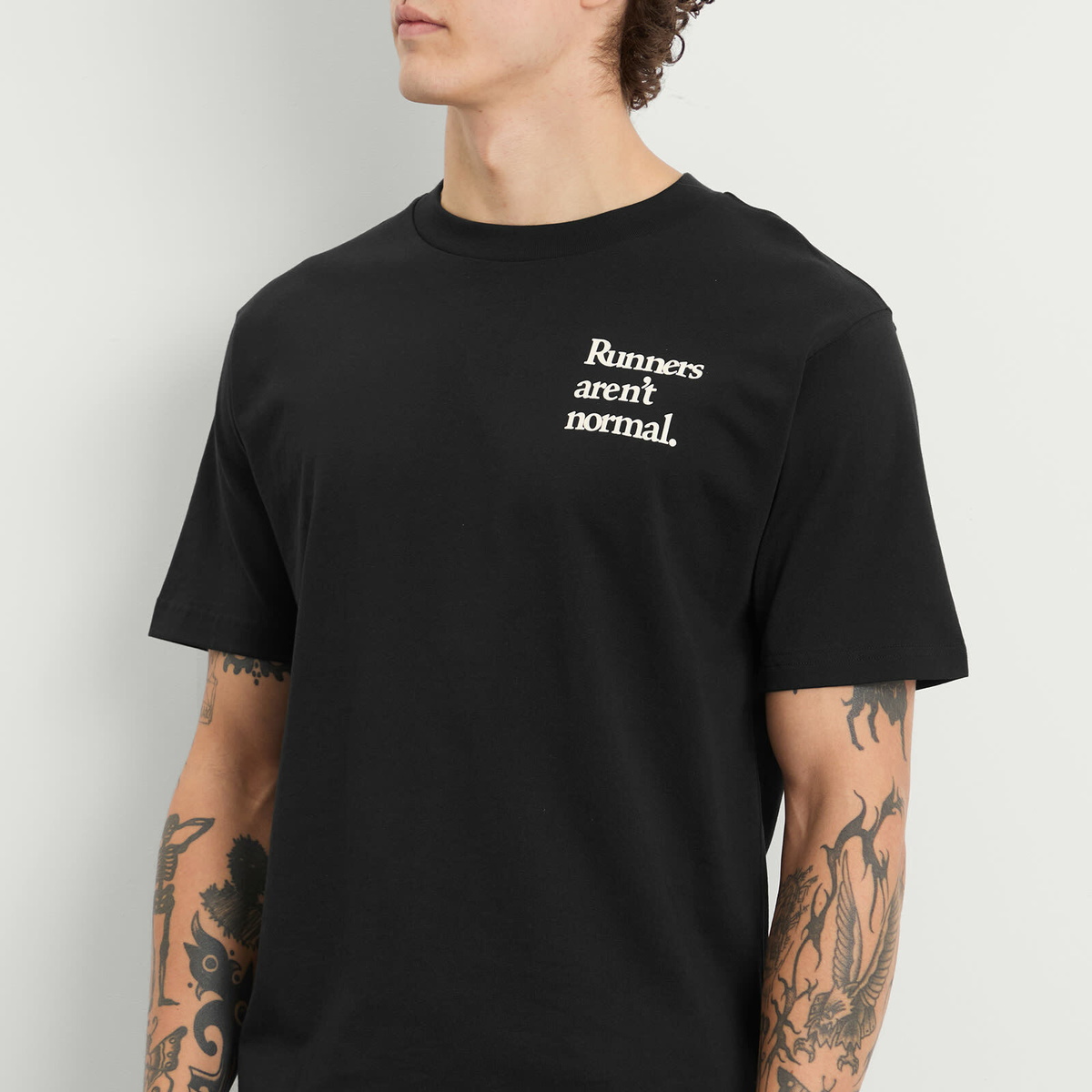 New Balance Men's Runners Arent Normal T-Shirt in Black