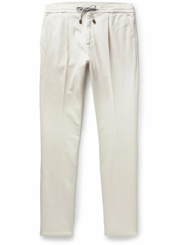 Photo: Brunello Cucinelli - Tapered Pleated Cotton-Blend Twill Drawstring Trousers - Neutrals