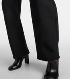 Alaïa High-rise wool barrel-leg pants
