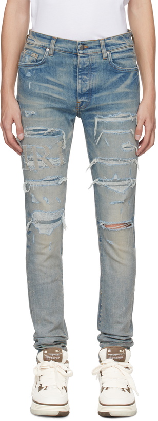 Photo: AMIRI Blue Repair Logo Thrasher Jeans