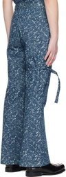 The World Is Your Oyster Blue Snow-Washed Jeans