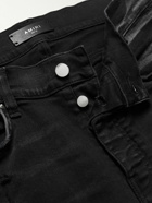 AMIRI - Skinny-Fit Appliquéd Distressed Jeans - Black