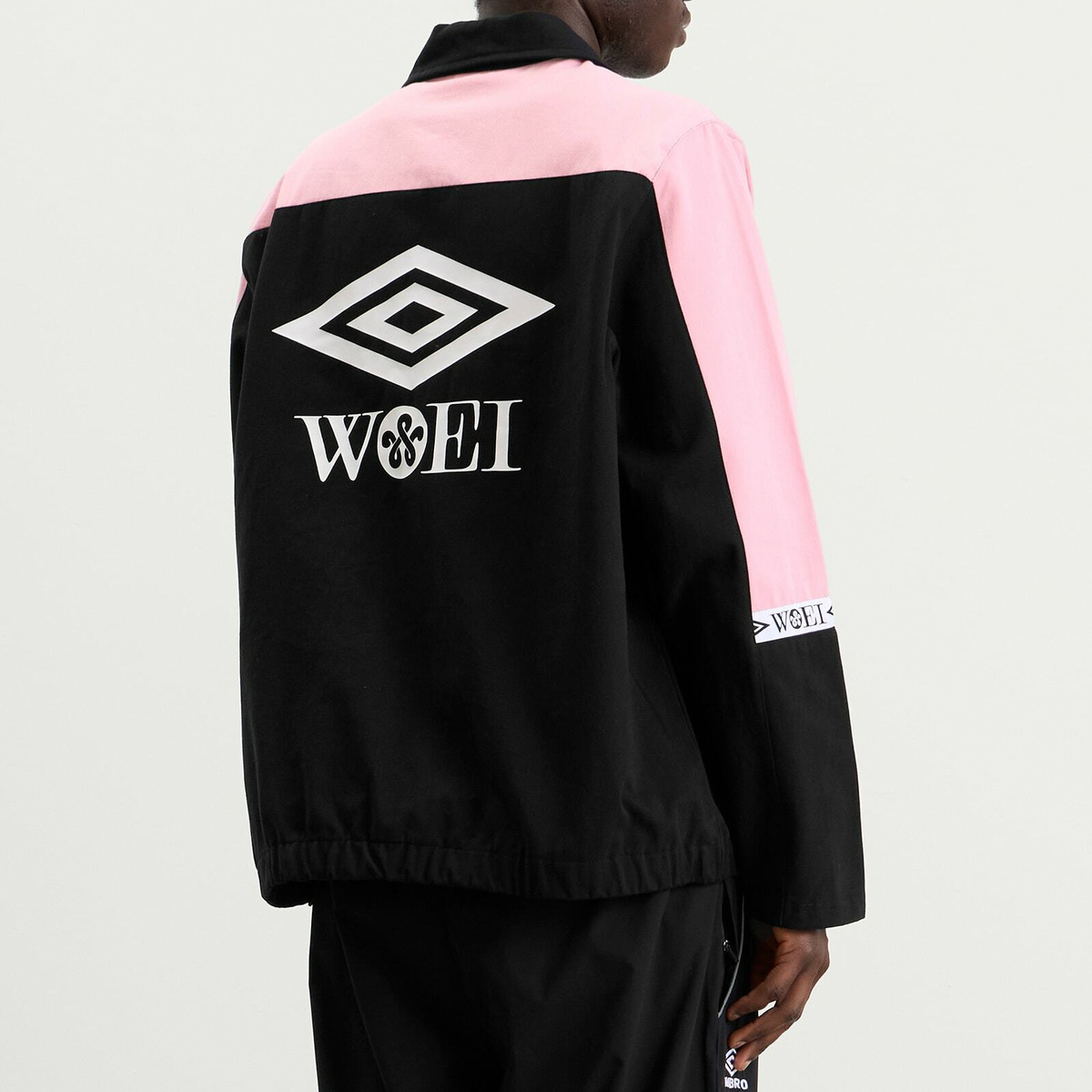 Umbro Men's x WOEI Drill Top in Black/Pink