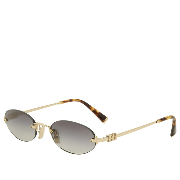 Photo: Miu Miu Eyewear A54S Sunglasses in Pale Gold/Grey Gradient 