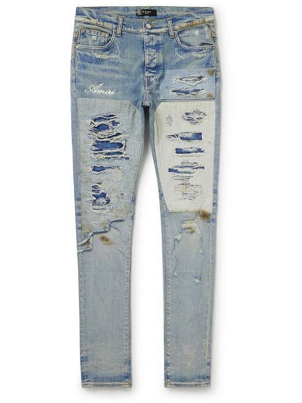 Photo: AMIRI - Skinny-Fit Logo-Embroidered Distressed Patchwork Jeans - Blue