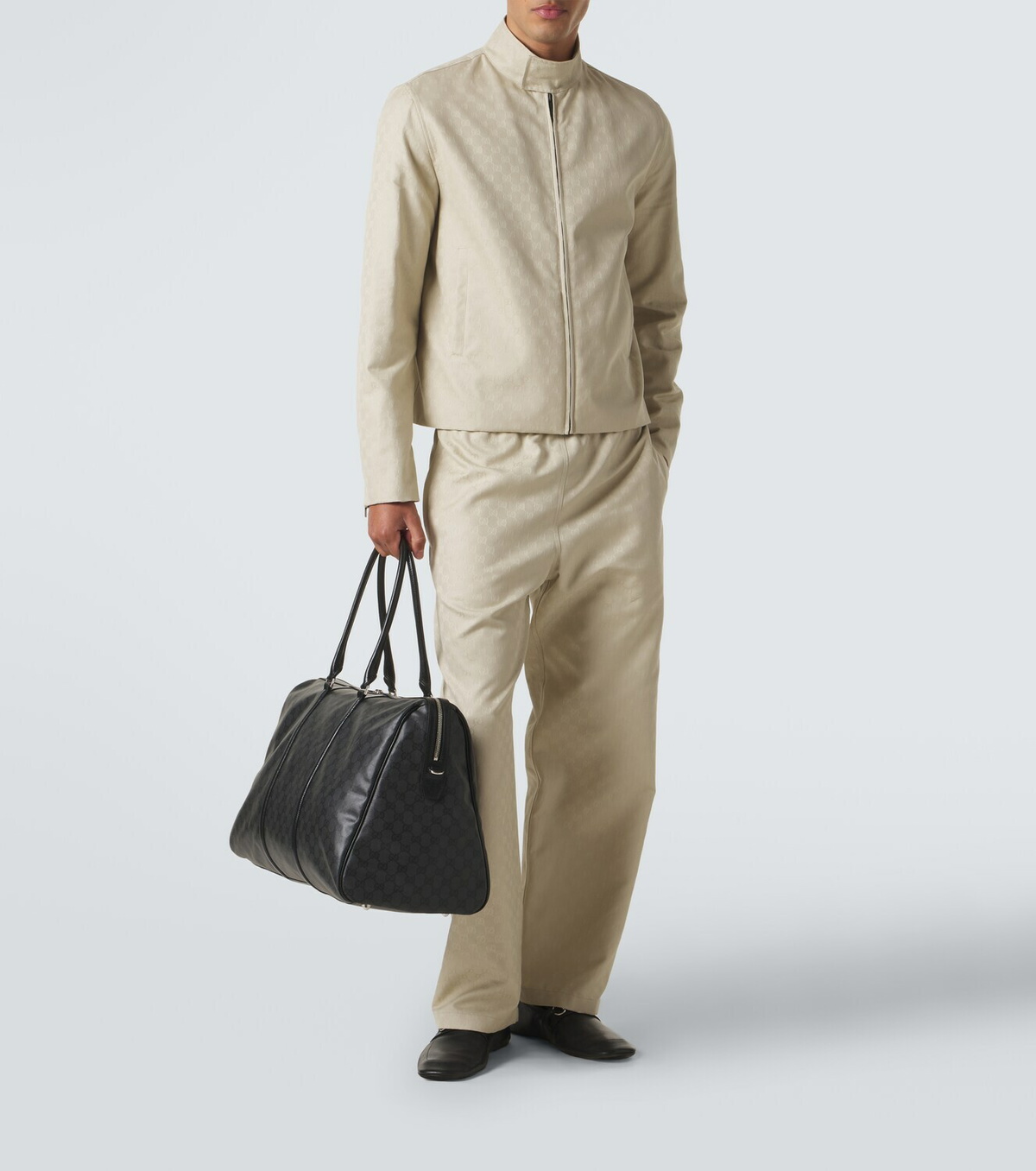 Gucci GG canvas leather-trimmed duffel bag