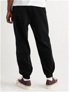 WACKO MARIA - Tapered Logo-Embroidered Cotton-Blend Velour Sweatpants - Black