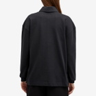Nike Women's Essential Oversized Long-Sleeve Polo in Black/Sail