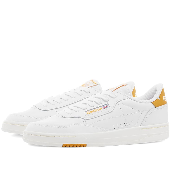 Photo: Reebok Men's Court Peak Sneakers in White/Chalk/Bright Ochre