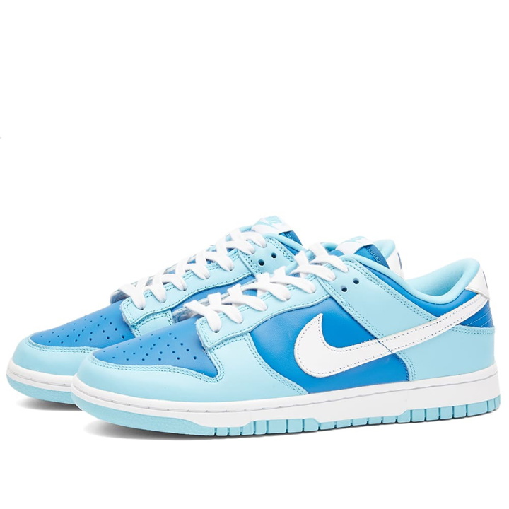 Photo: Nike Dunk Low Retro Qs Sneakers in Flash/White/Argon Blue