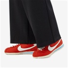 Nike Women's W Cortez Txt Sneakers in Picante Red/University Blue/Coconut Milk