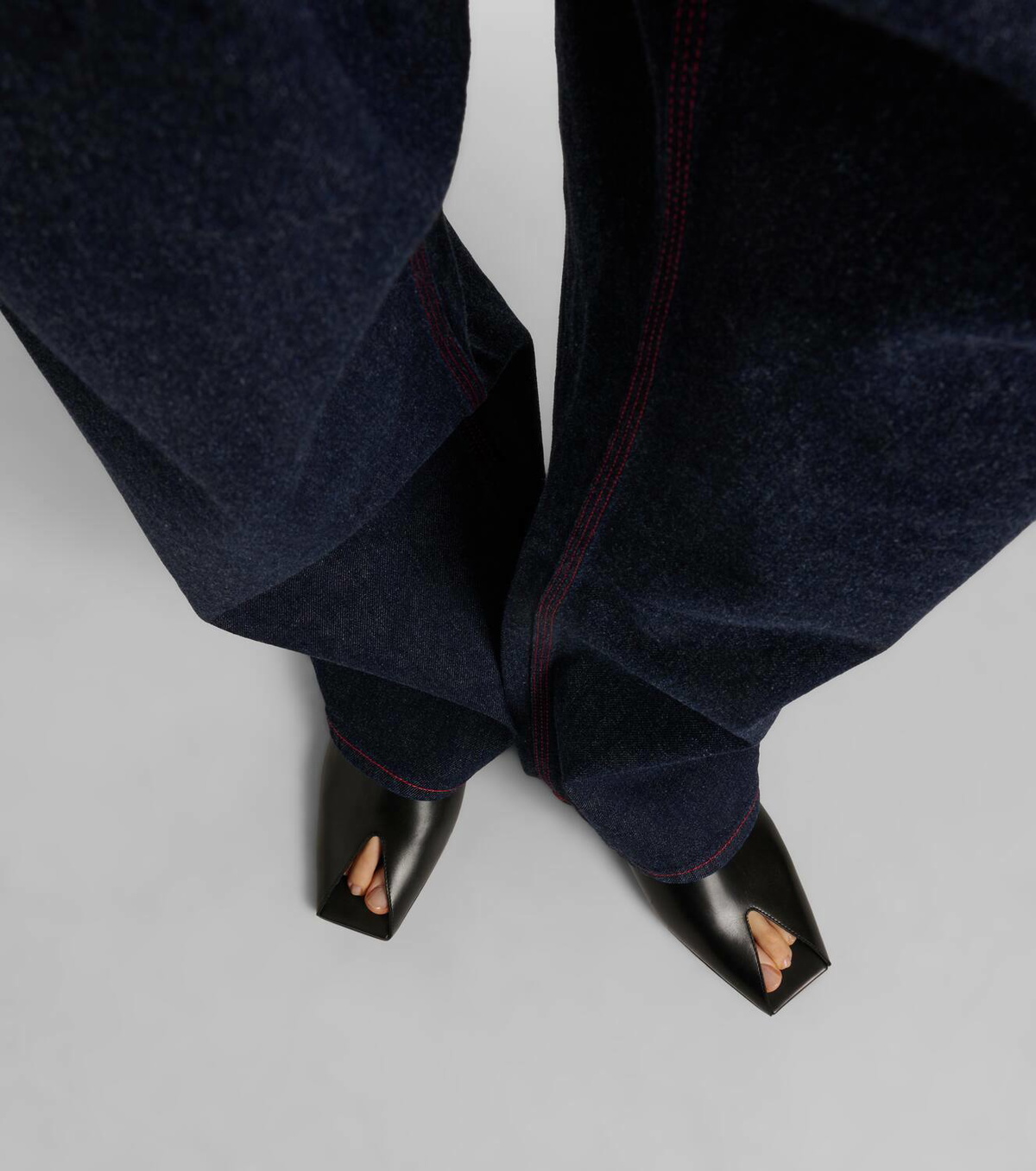 ALAIA SPIKE JEWEL MULES IN BLACK CALFSKIN main image 0