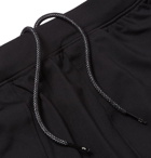 Under Armour - UA Rush Cellient Tapered Stretch Tech-Jersey Sweatpants - Black