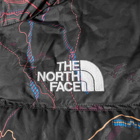 The North Face Men's 1996 Retro Nuptse Trail Glow Print Vest in Tnf Black Trail Glow Print