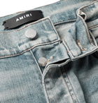 AMIRI - Thrasher Skinny-Fit Distressed Panelled Stretch-Denim Jeans - Blue