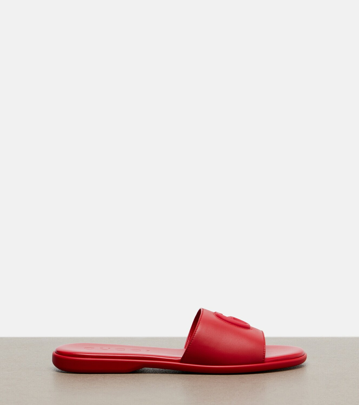Gucci Double G leather slides