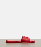 Gucci Double G leather slides