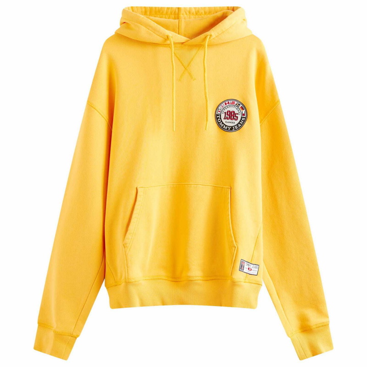 Photo: Tommy Jeans Men's Archive Games Hoodie in College Gold