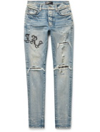 AMIRI - Skinny-Fit Appliquéd Panelled Distressed Jeans - Blue