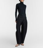 Alaïa Invisible patent leather thong sandals