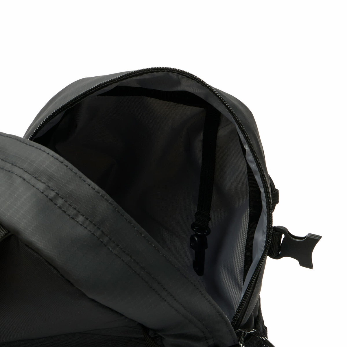 Eastpak Sling Bag Pro in Rip Black Coat 
