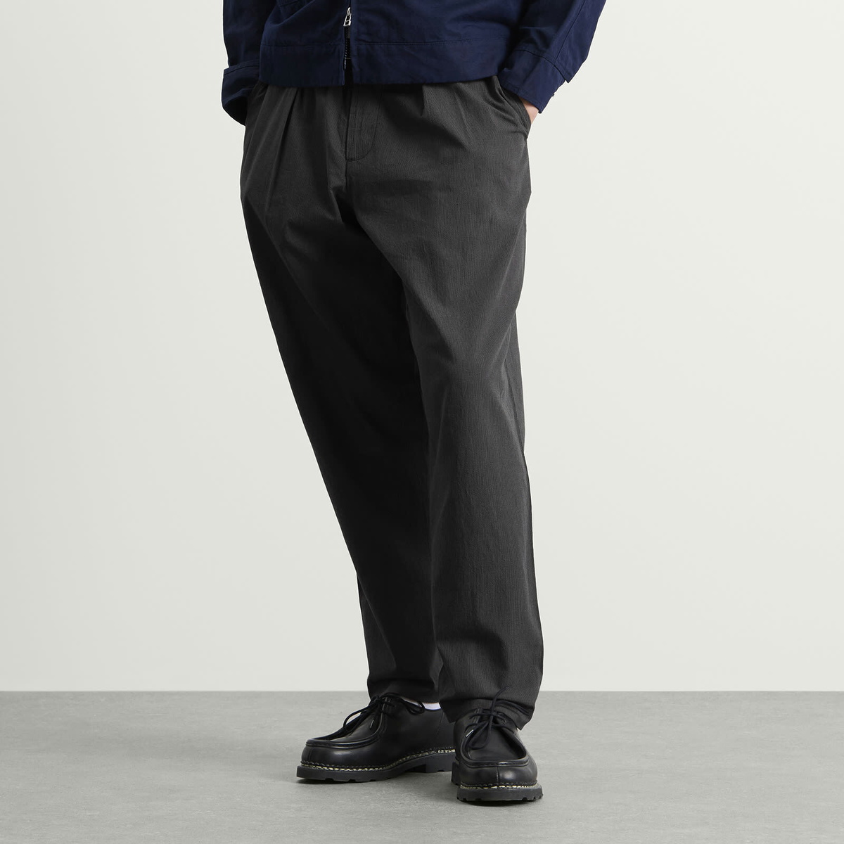 Universal Works Men's Seattle Cotton Pleated Track Pant in Charcoal