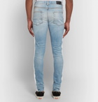 AMIRI - Stack Track Skinny-Fit Striped Distressed Stretch-Denim Jeans - Men - Mid denim