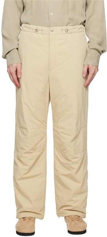 Photo: AURALEE Beige Biodegradable Nylon Over Trousers