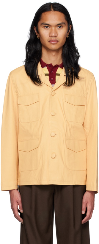 Photo: Lukhanyo Mdingi Yellow Button Leather Jacket