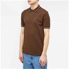 Fred Perry Men's Twin Tipped Polo Shirt in Burnt Tobacco/Dark Pink/Black