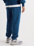 7 DAYS ACTIVE - Monday Logo-Print Organic Cotton-Jersey Sweatpants - Blue