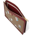 GUCCI - Doraemon Leather-Trimmed Printed Monogrammed Coated-Canvas Pouch - Brown