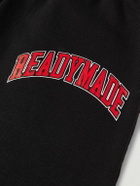 READYMADE - Tapered Logo-Print Cotton-Blend Jersey Sweatpants - Black