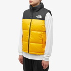 The North Face Men's 1996 Retro Nuptse Vest in Summit Gold/Tnf Black