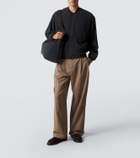 The Row Logan E/W leather-trimmed crossbody bag