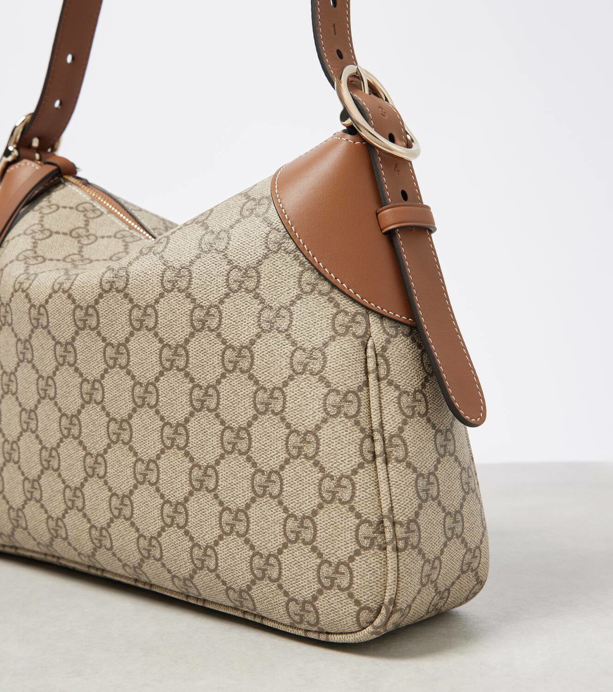 Gucci GG Canvas Medium leather-trimmed shoulder bag Gucci