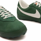 Nike Astrograbber Qs Sneaker in Fir/Black/Orange