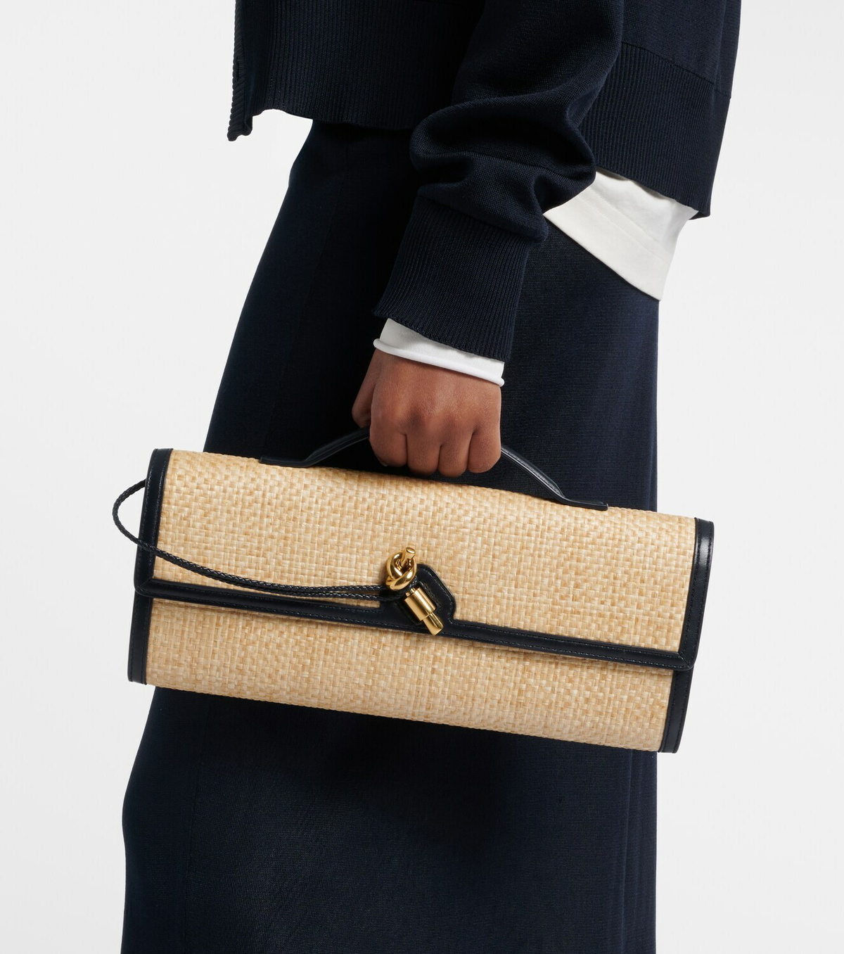 Bottega Veneta Andiamo leather-trimmed raffia clutch