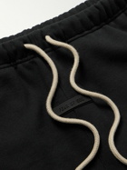 FEAR OF GOD ESSENTIALS - Straight-Leg Logo-Flocked Cotton-Blend Jersey Sweatpants - Black