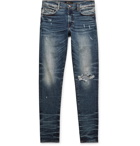 AMIRI - Skinny-Fit Distressed Stretch-Denim Jeans - Indigo