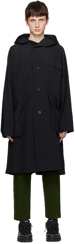 Photo: HOMME PLISSÉ ISSEY MIYAKE Black Acclimation Coat