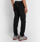 Vetements - Tapered Logo-Print Loopback Cotton-Jersey Sweatpants - Black